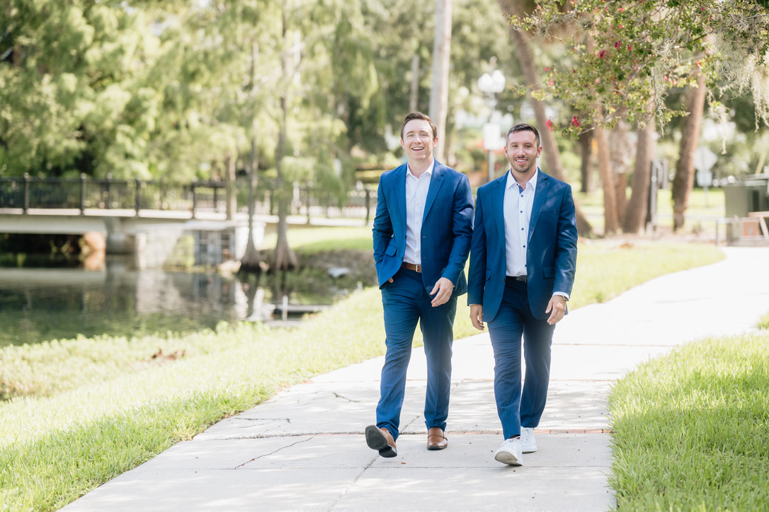 Tony and colleague walking by the lake